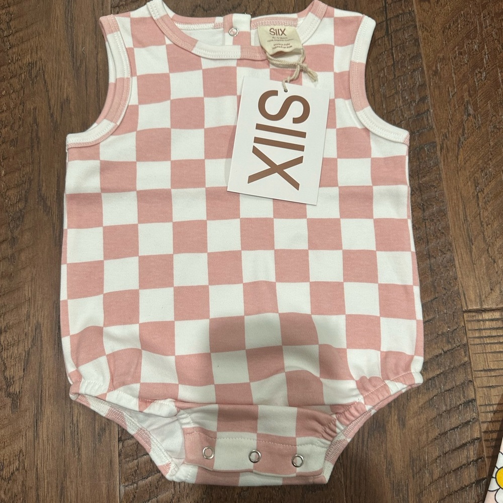 Pink checkered tank top romper in pink